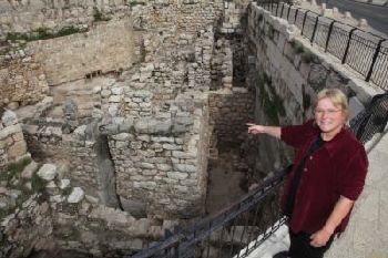 Dr. Eilat Mazar, Hebrew University of Jerusalem archaeologist, points to the tenth century B.C.E. excavations that were uncovered under her direction in the Ophel area adjacent to the Old City of Jerusalem. -  (Hebrew University photo by Sasson Tiram)